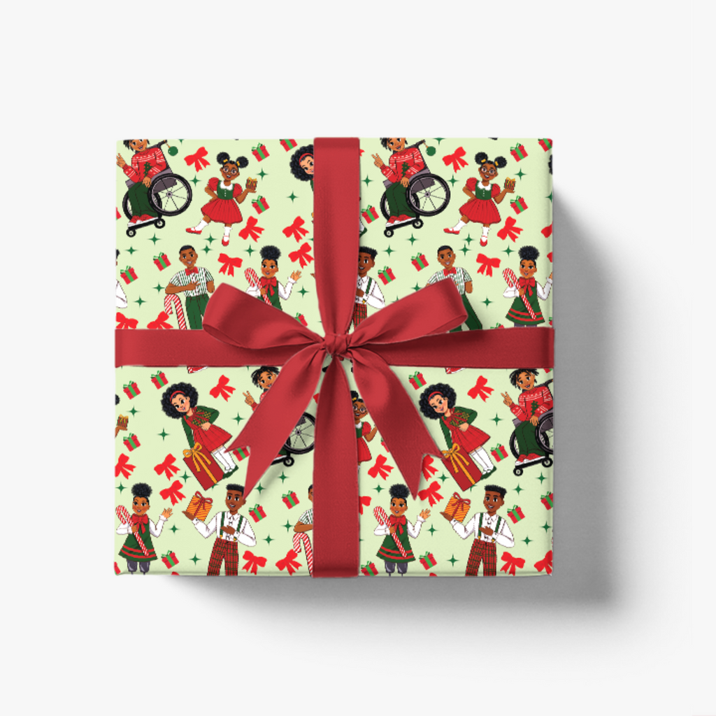 A square gift box wrapped in festive wrapping paper with a repeating pattern of Black children, red bows, and red envelopes on a pale green background, tied with a wide red ribbon and bow, shown on a clean white background.